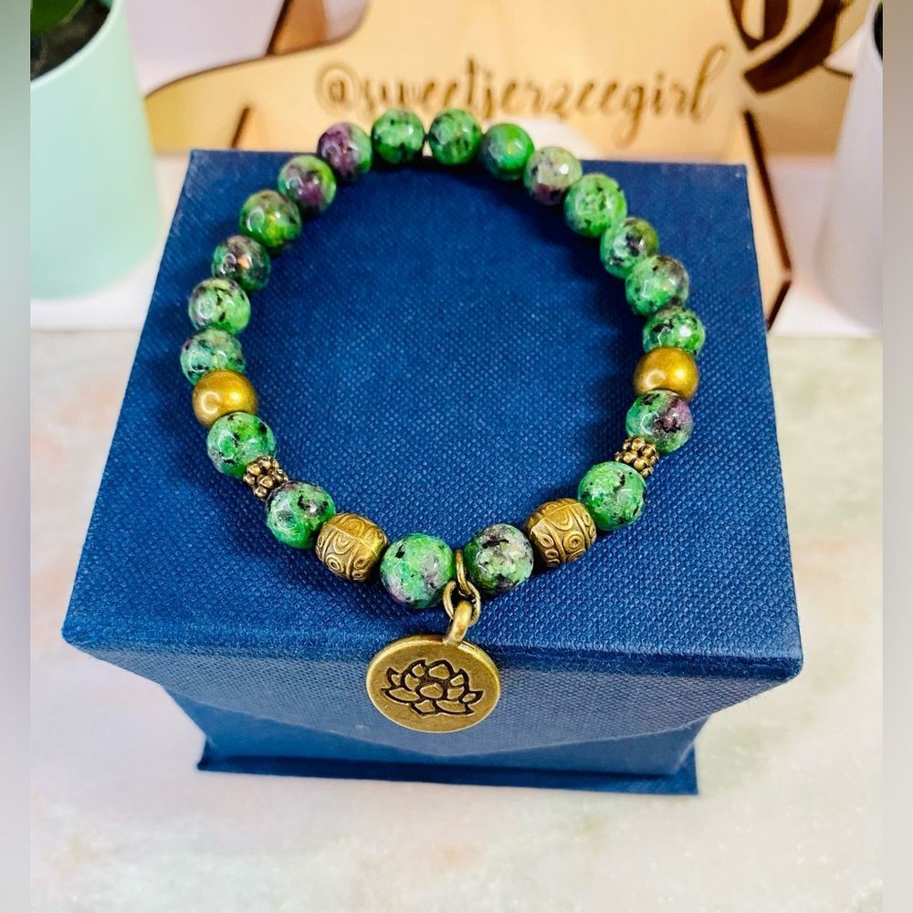 Ruby Zoisite Lotus Antique Bronze Finish Charm Stretch Bracelet